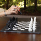 Black and White Marble Statue Chess Set Placing on the table 