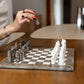 Grey and White Marble Statue Chess Set placing on the table