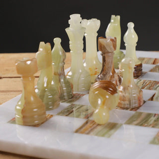 green and white chess pieces