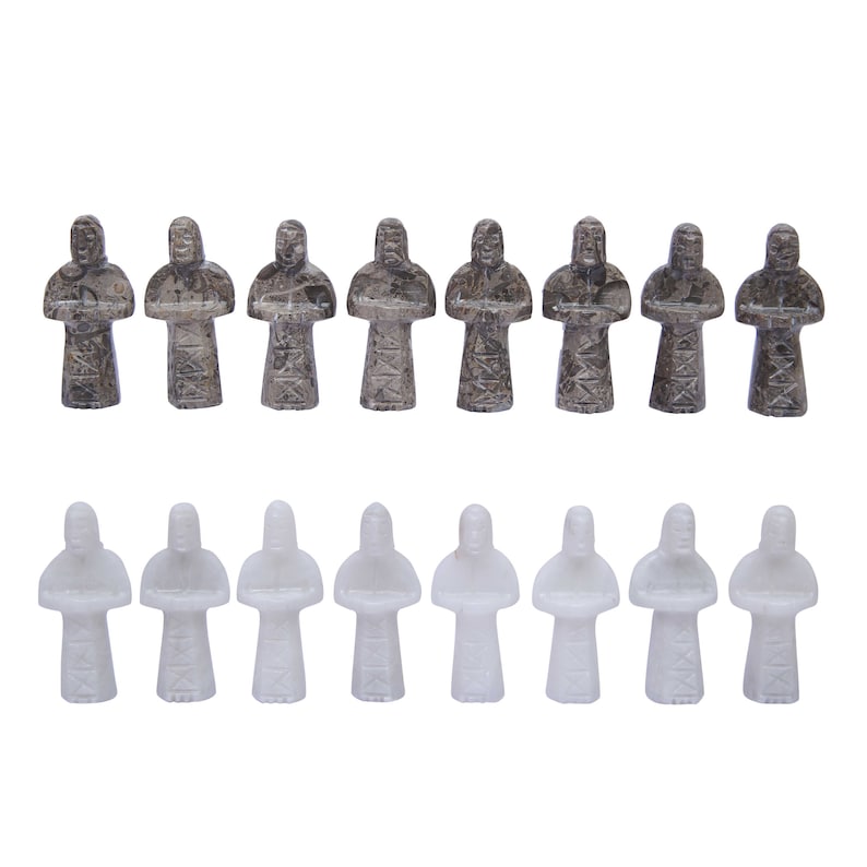 grey and white ancient egyptian gods chess figures