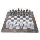 grey and white antique marble chess set with white background