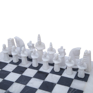 White and Black chess board with  white Ancient Egyptian Chess Pieces