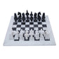 white and black chess board with anciant egyptian gods chess pieces