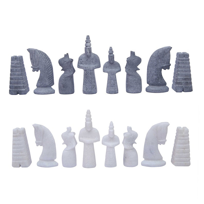 white and black marble antique chess figures