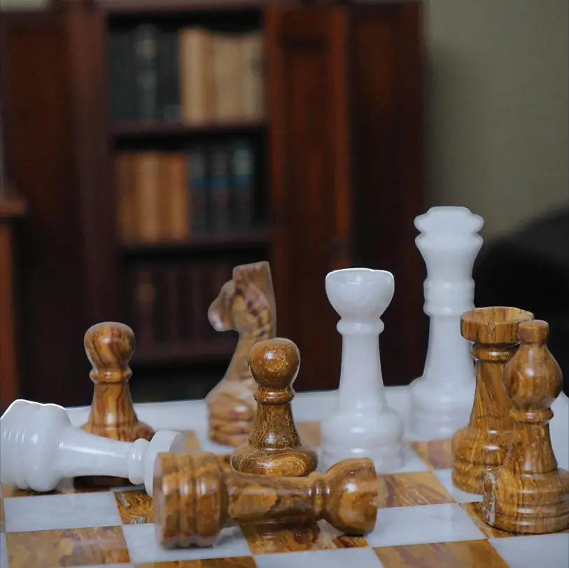 white dark brown chess figure