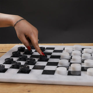 white and black fancy chess figures